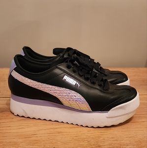 Puma Black Leather Sneaker With Lavender Iridescent detail.